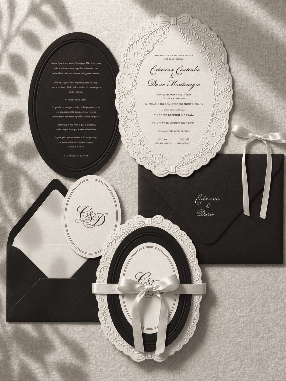 Wedding invitation suite with embossed oval cards, monogram and satin ribbon